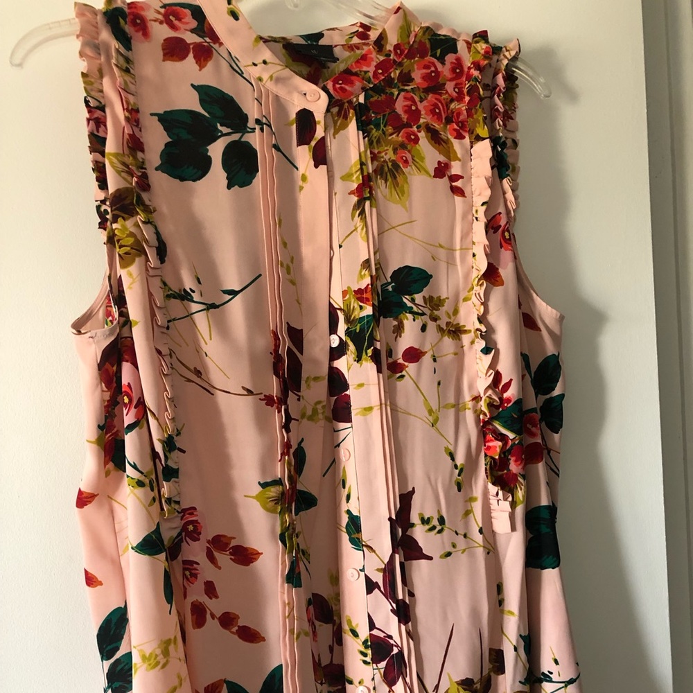 Sleeveless button-down blouse